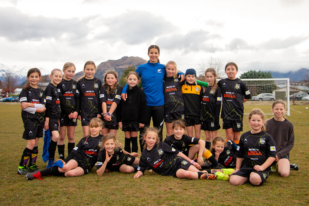 Happy female footballers